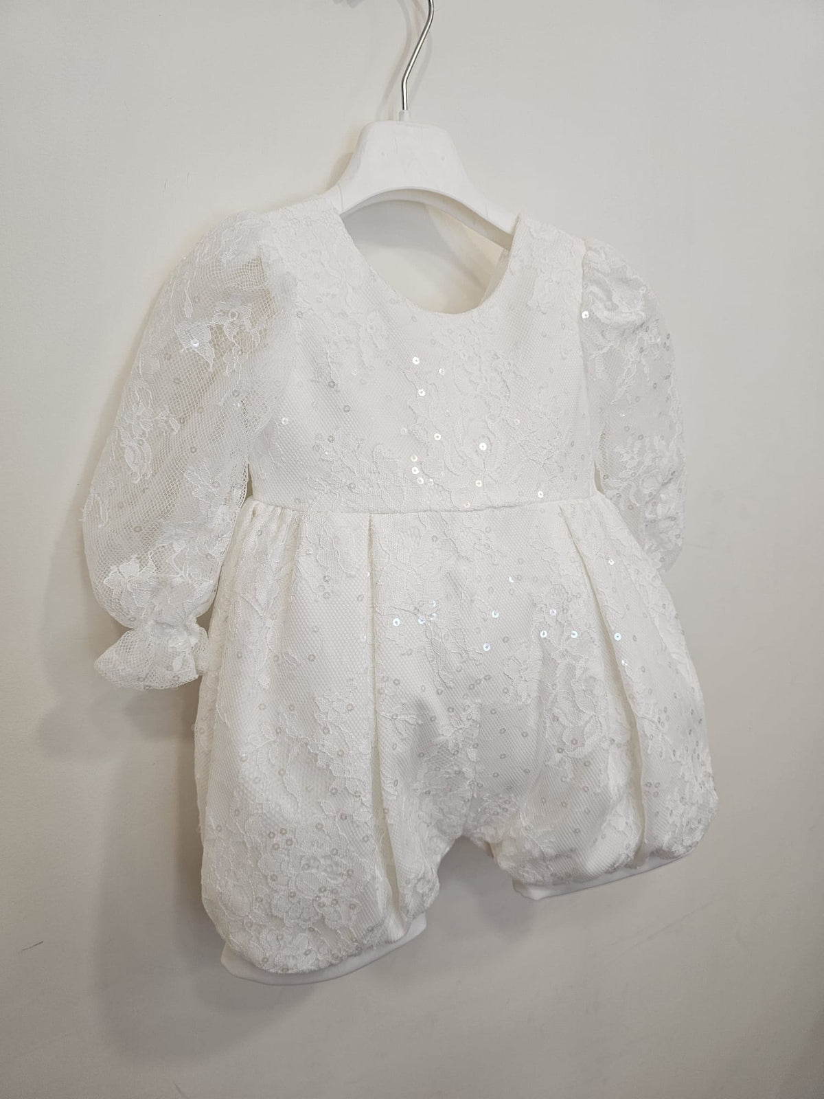 Pagliaccetto neonata con gonnellina staccabile